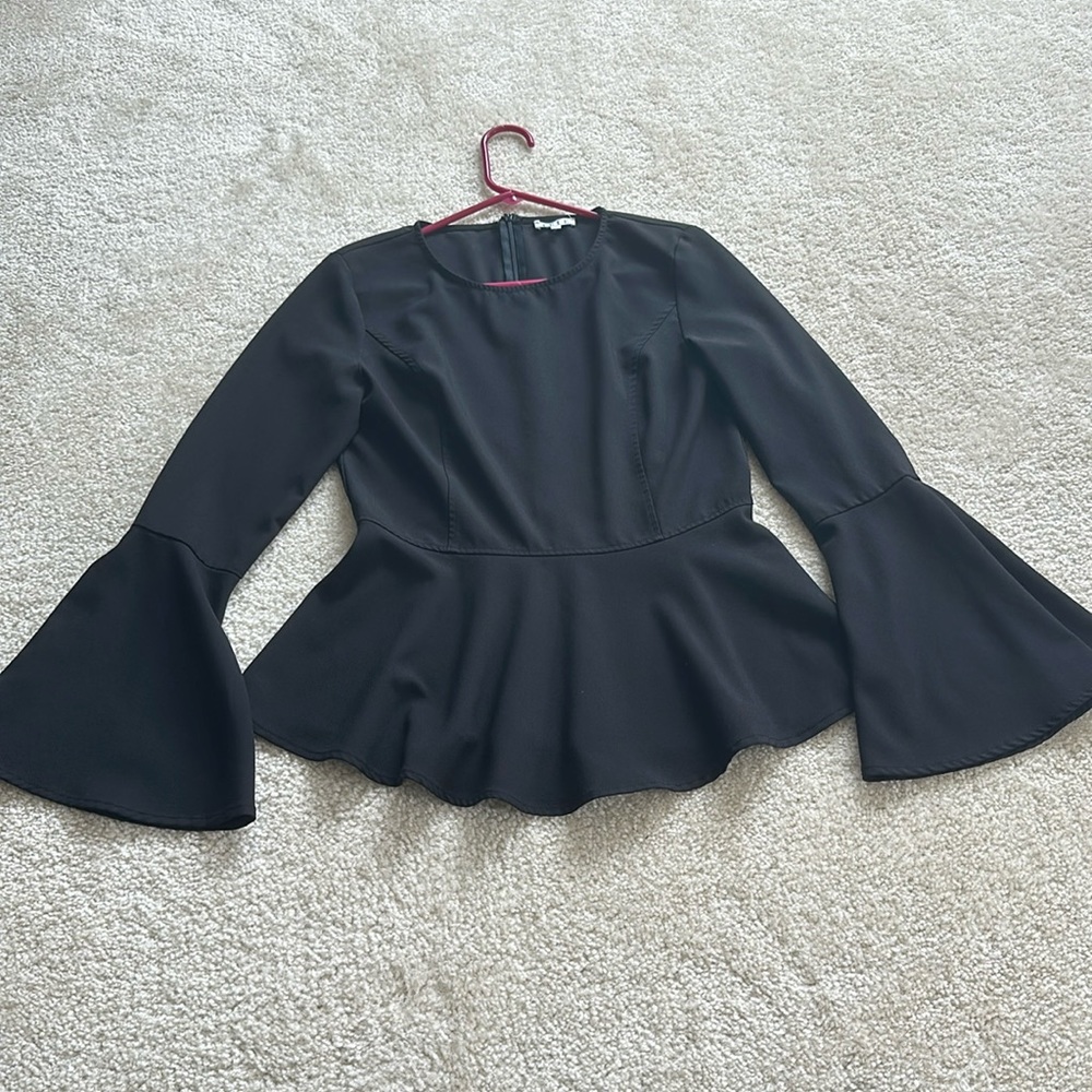 VICI Top- Black Peplum Top - medium size. Pinched waste and flare bottom